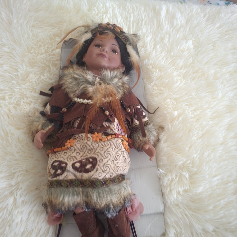 Nwop. Cathay collection american indian doll on swing